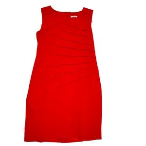 Calvin Klein Dress with layered burst pattern. Conforms to shape.